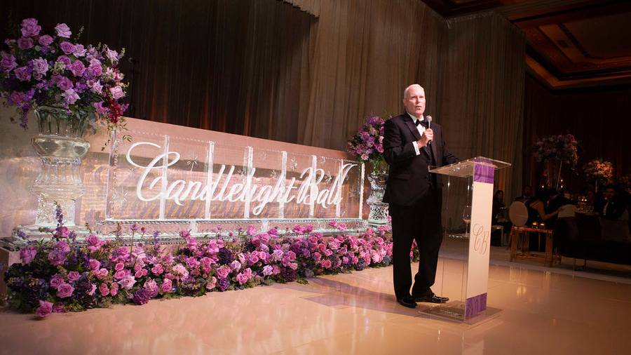 Scripps Health President and CEO Chris Van Gorder speaks at the Candlelight Ball in San Diego.