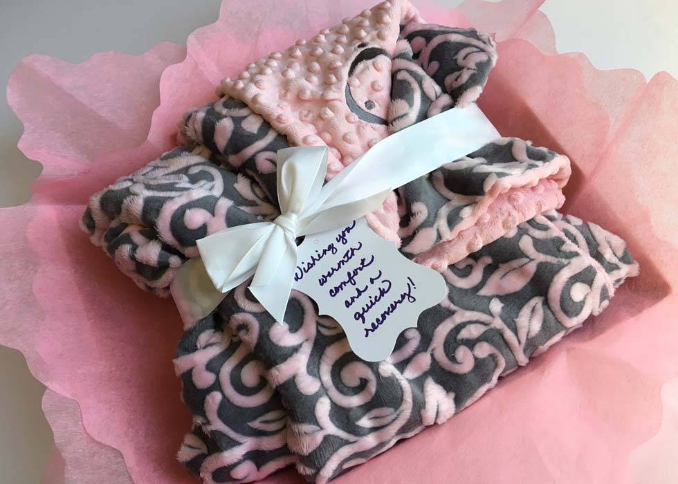 Generous philanthropic gifts help provide hundreds of warm, soft blankets to Scripps MD Anderson Cancer Center patients.