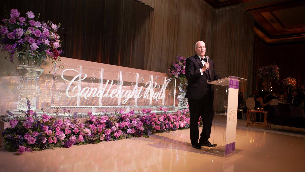 Chris Van Gorder, president and CEO of Scripps Health, welcomes guests at the Candlelight Ball.