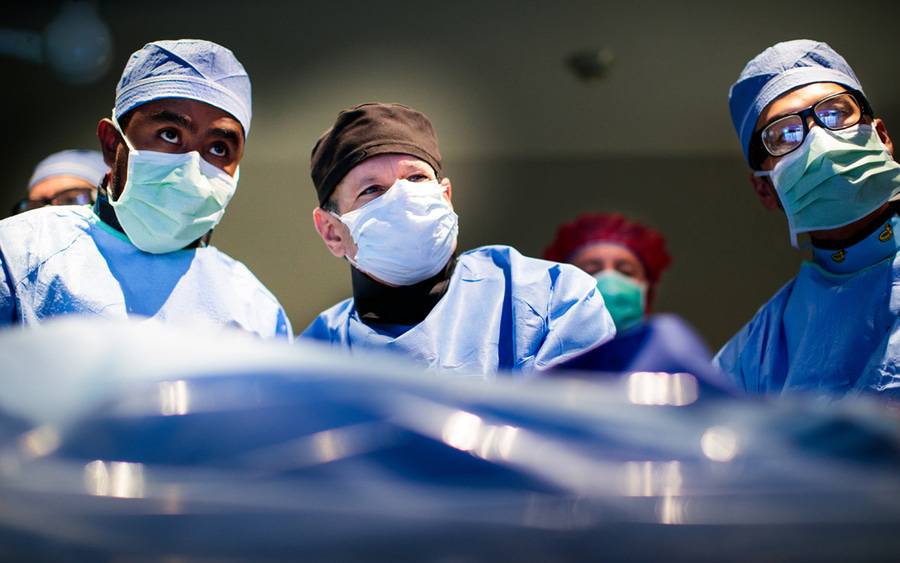 Paul Teirstein, MD, Scripps Clinic, center, performs surgery with team at Scripps Memorial Hospital La Jolla.