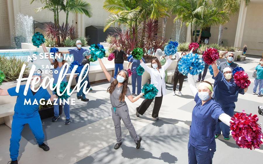 Members of Scripps Health frontline staff in the fight against COVID celebrate Luis Sztuden's discharge from the hospital.