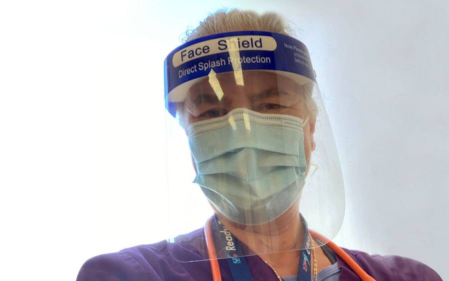 Dr. Noemi Doohan, shown here in a face shield and mask, was the first patient enrolled in the Scripps MD Anderson study site.