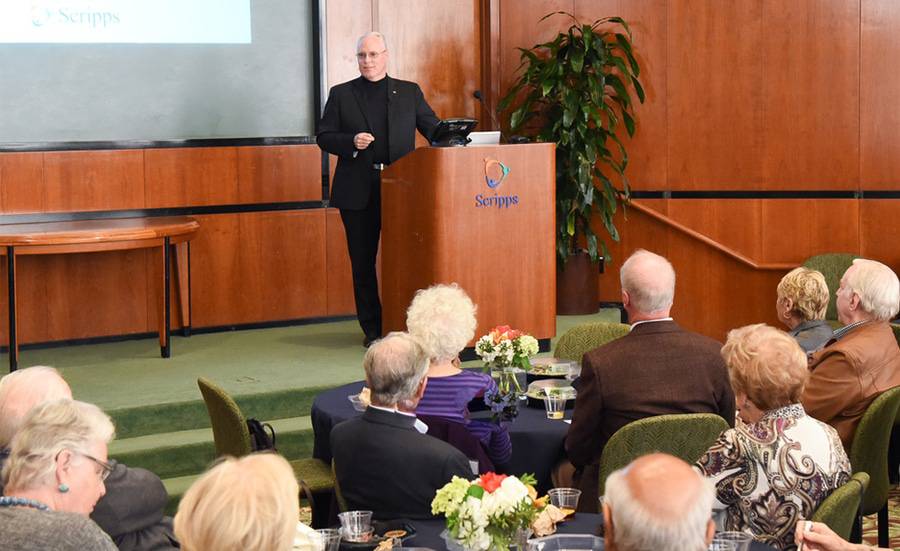 Chris Van Gorder, president and CEO of Scripps, talks to President's Council members.